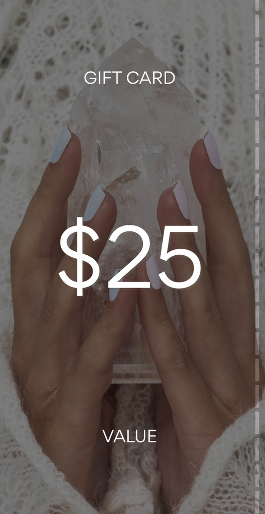 Gift card with $25 value held by a hand against a textured background. Pure Energy Crystals Gift Card $25