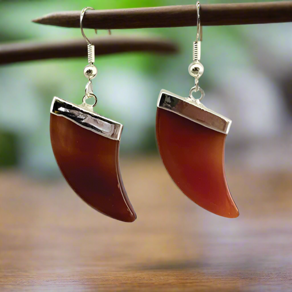 Silver plated boho-style earrings featuring natural multicolor agate horn-shaped stones, ideal for festival or casual wear.