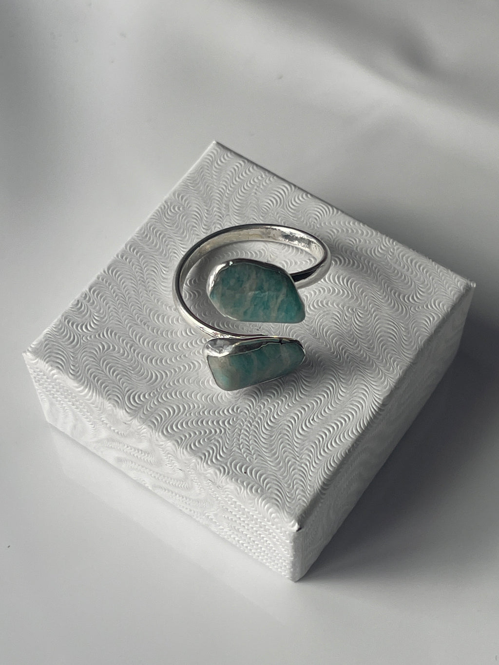 Amazonite Ring silver plated at Pure Energy Crystals in Florida on jewelry box top 