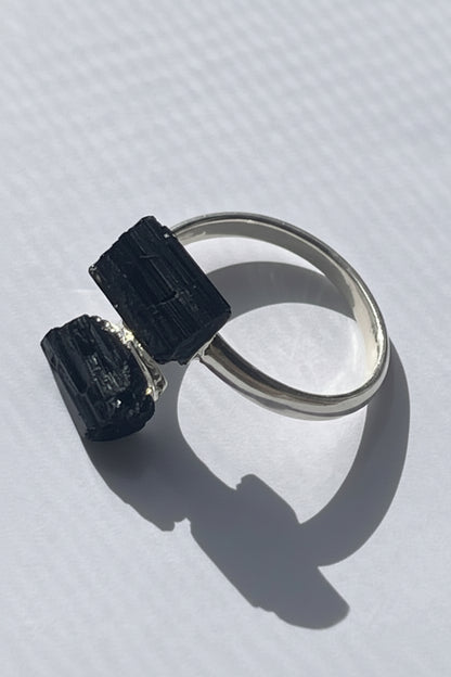 Black Adjustable silver  plated Tourmaline Ring at Pure Energy Crystals In Florida On table 