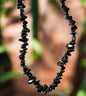 Black tourmaline chip necklace with natural stones for grounding, protection, and energy cleansing