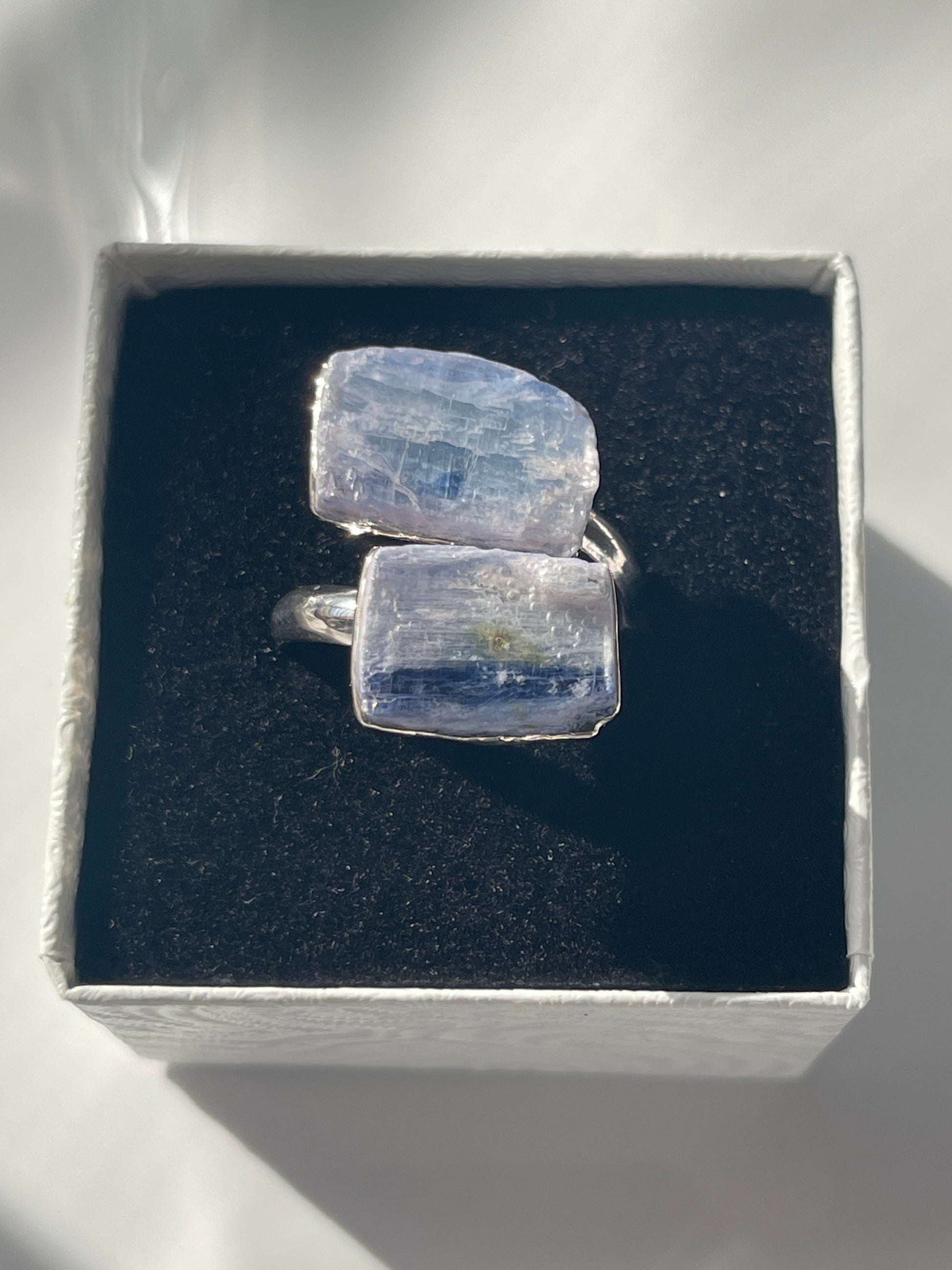 Blue Kyanite adjustable silver plated ring in studio 