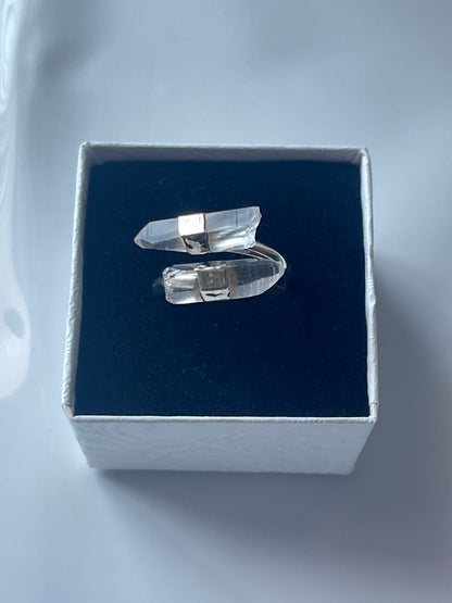 Clear quartz silver plated ring in a jewelry box on a white background 