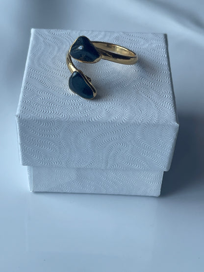 Hematite Adjustable Ring Gold Plated on top of a jewelry box in Florida 