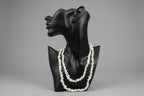 Black jewelry display with Mother_of_Pearl_Necklace_30-32_Inches
