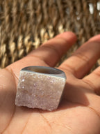 Crystal rock held in a hand with a blurred natural background Natural Agate Druzy Ring Pure Energy Crystals Florida