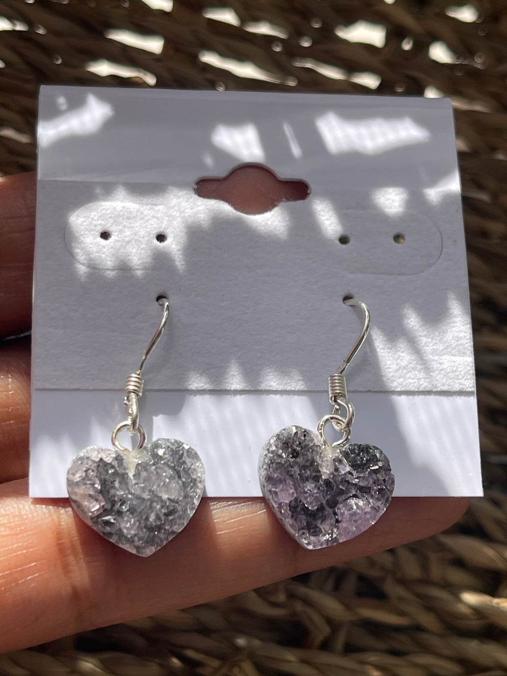 Natural Amethyst Heart Earrings At Pure Energy Crystals in Florida In hand 