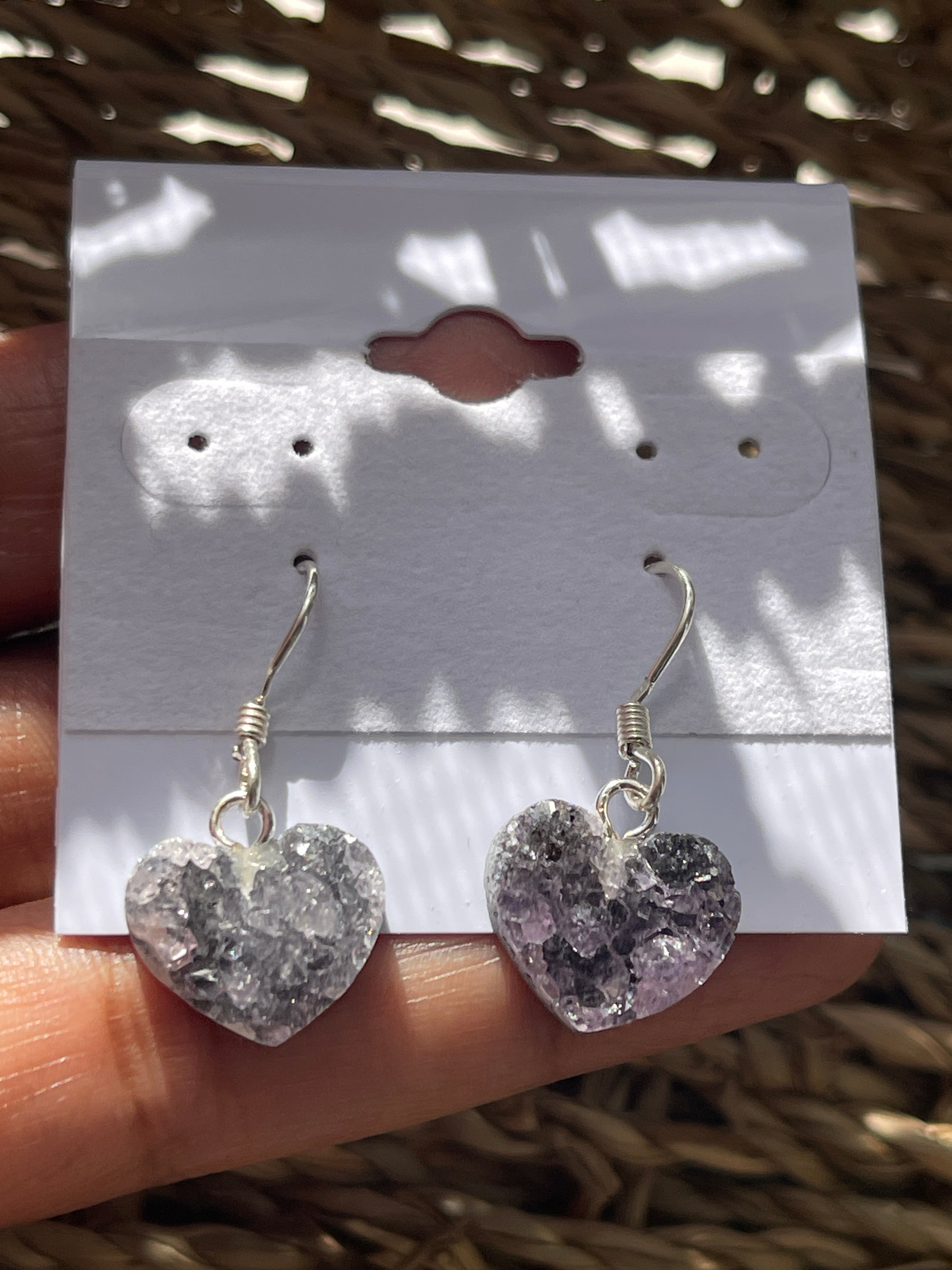 Natural Amethyst Heart Earrings At Pure Energy Crystals in Florida In hand 