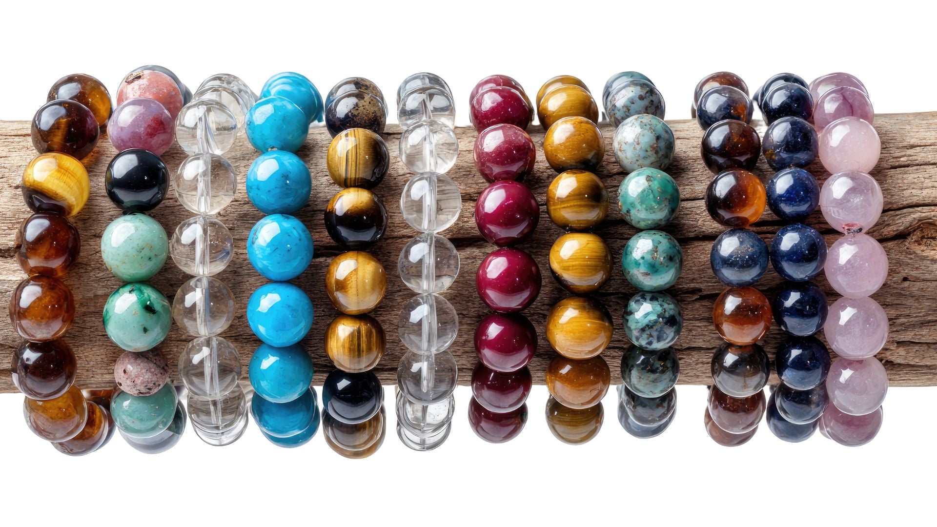 Set of colorful beaded bracelets on a wooden stick