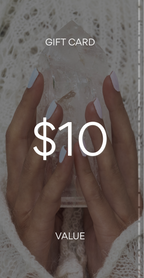 Gift card with $10 value held by a hand on a textured surface. Pure Energy Crystals Gift Card $10