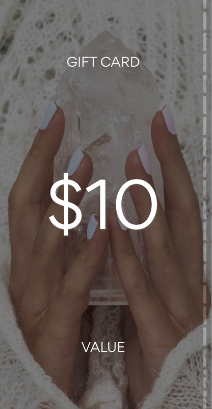 Gift card with $10 value held by a hand on a textured surface. Pure Energy Crystals Gift Card $10