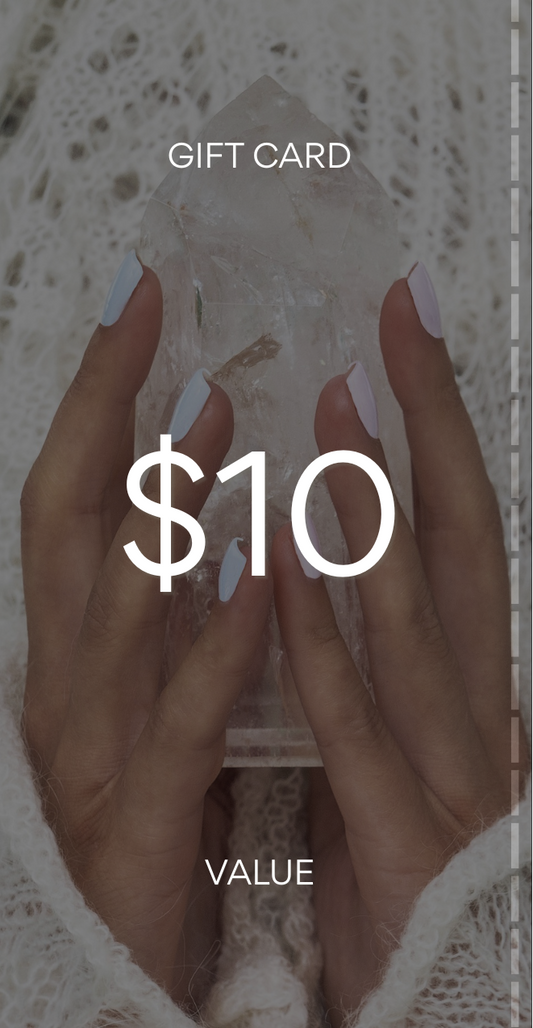 Gift card with $10 value held by a hand on a textured surface. Pure Energy Crystals Gift Card $10