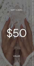 Gift card with $50 value held by hands on a textured background. Pure Energy Crystals Gift Card $50