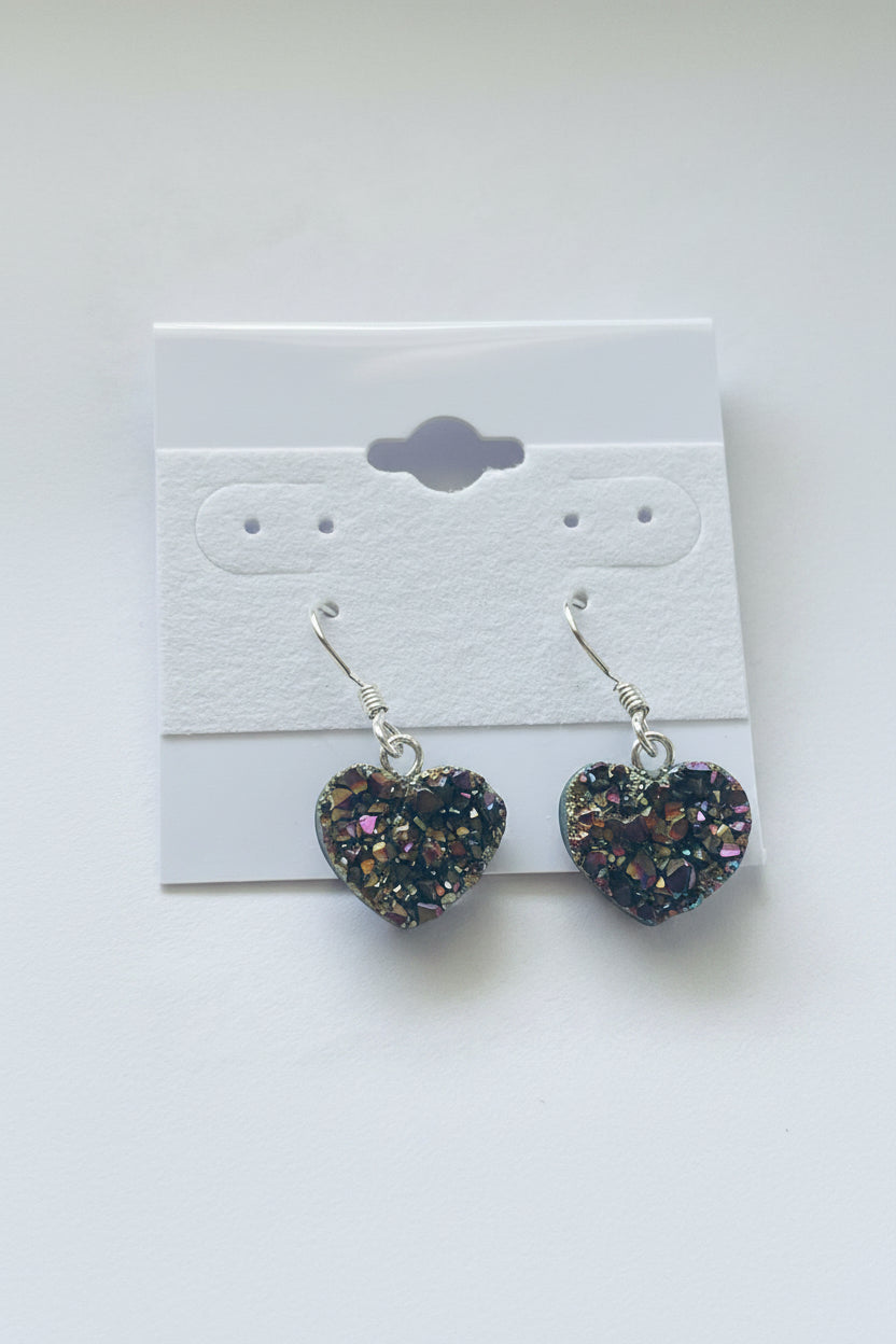 Rainbow Heart Coated Amethyst Earrings, Heart-shaped earrings on a white card with a gray background
