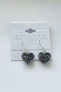 Rainbow Heart Coated Amethyst Earrings, Heart-shaped earrings on a white card with a gray background