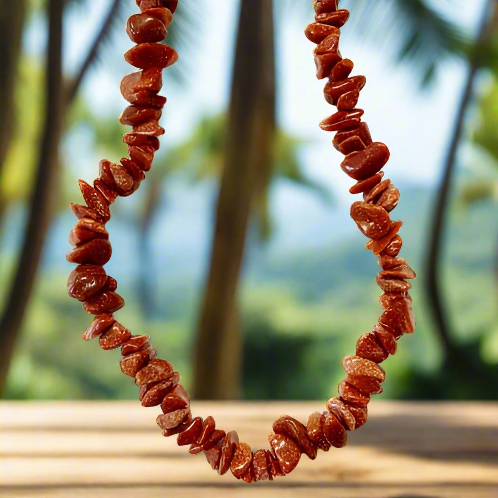 Red goldstone necklace with sparkling crystal beads for confidence and positive energy