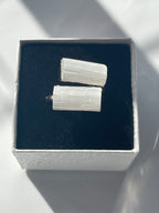selenite ring silver plated inside a black and white jewelry box in Florid studio by pure energy crystals