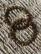 Tigers Eye Bracelets In Florida at Pure Energy Crystals In a basket 