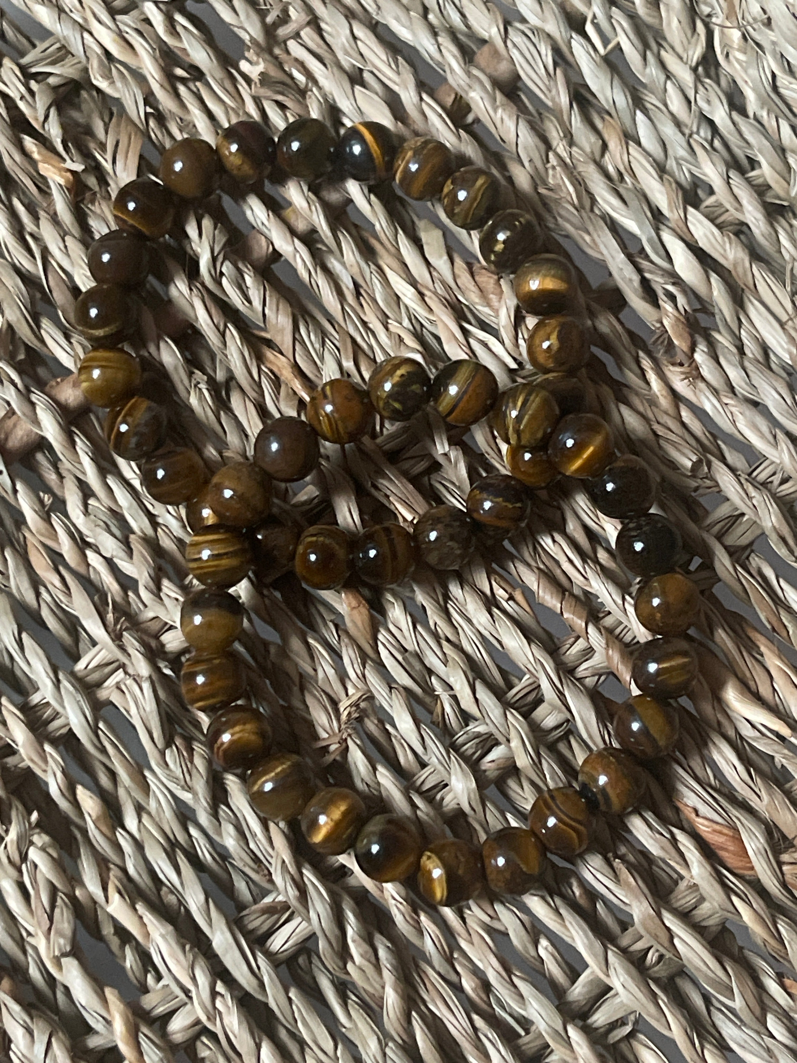 Tigers Eye Bracelets In Florida at Pure Energy Crystals In a basket 