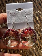 Tree of Life Circle Earrings Garnet in hand in Florida 