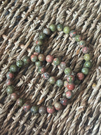 Unakite 8 mm Bracelets Pure Energy Crystals in Florida In a basket 